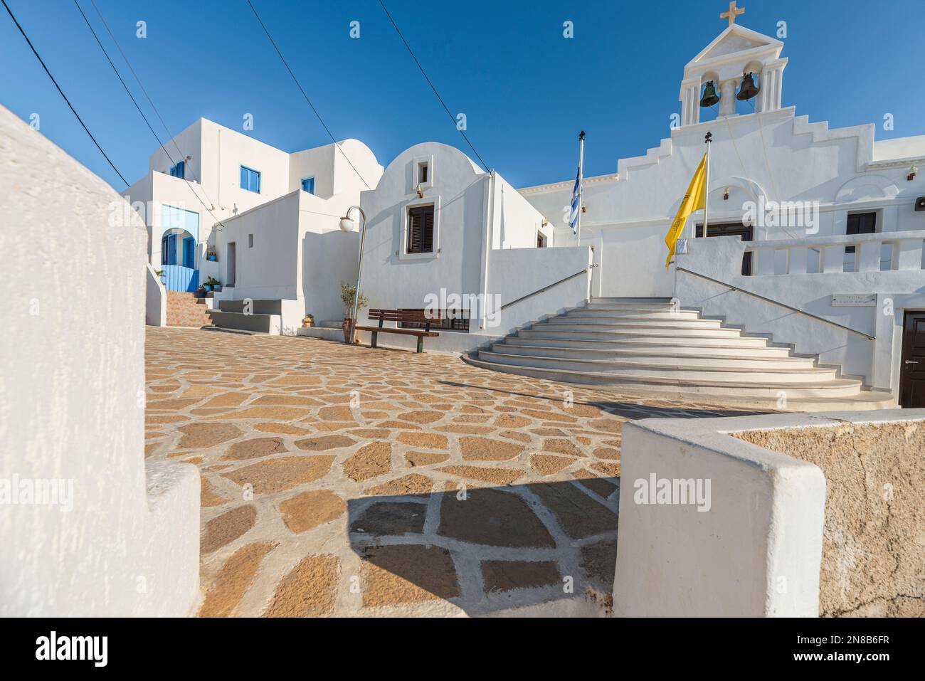 The main square of the picturesque village of Chora, Anafi Stock Photo