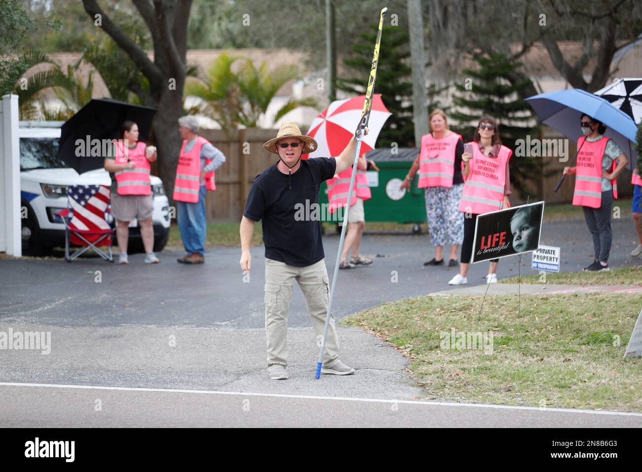 Anti-abortion activists and protesters shout at patients arriving outside of Bread and Roses Woman's Health Center, a clinic that provides abortions in Clearwater, Florida, U.S. February 11, 2023.  REUTERS/Octavio Jones Stock Photo