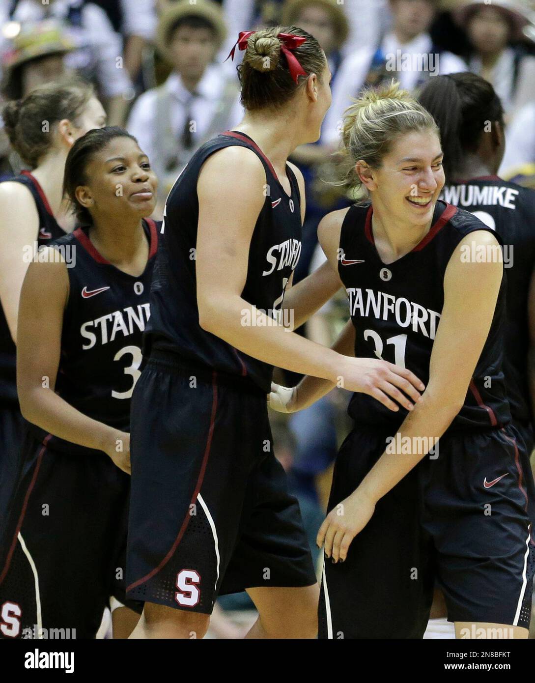 Stanford's Toni Kokenis, right, celebrates with teammate Joslyn Tinkle ...