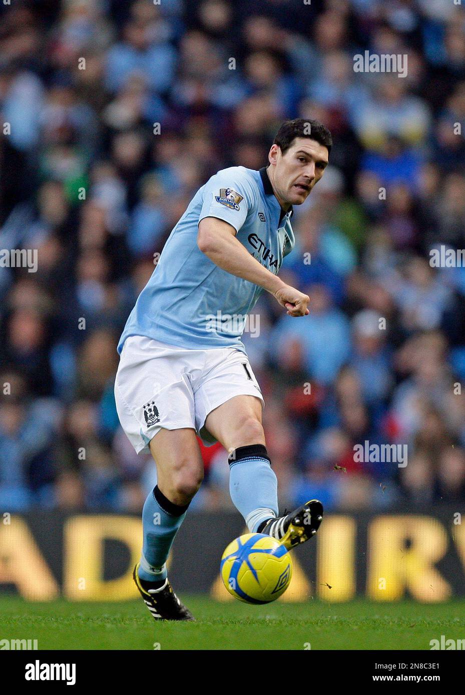 Manchester City's Gareth Barry controls the ball during an English FA ...