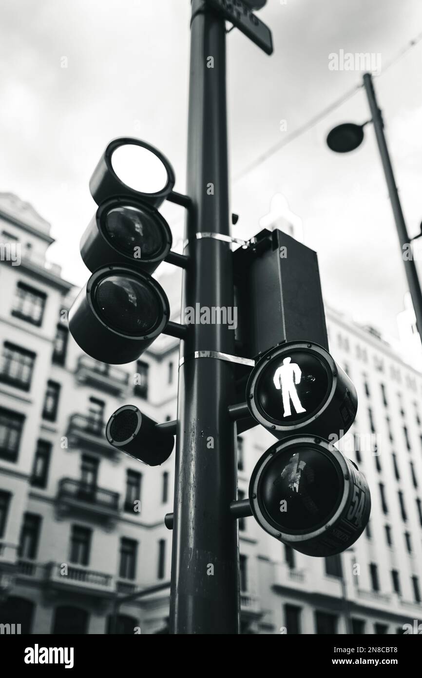 A vertical shot of street signs in black and white Stock Photo - Alamy