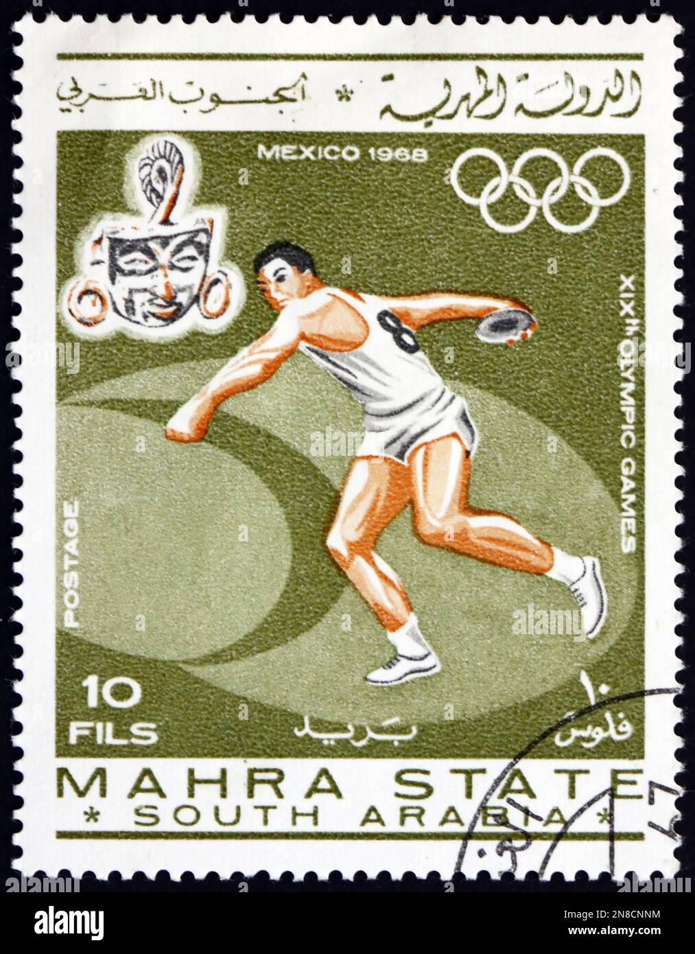 MAHRA STATE - CIRCA 1967: a stamp printed in Mahra Sultanate shows discus-throwing, Summer Olympics 1968, Mexico City, circa 1967 Stock Photo