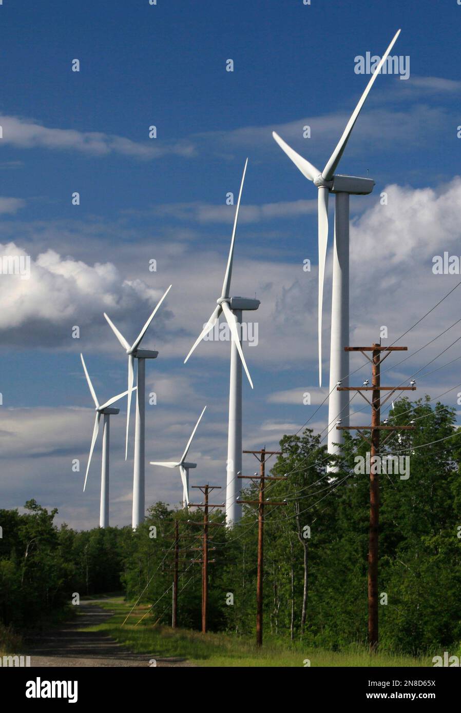 FILE In this file photo made July 14, 2009, wind turbines tower over