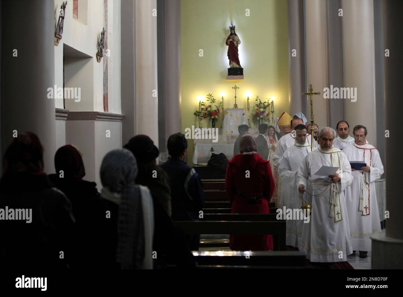 Iranian Christians perform Christmas mass at the Saint Joseph Chaldean ...