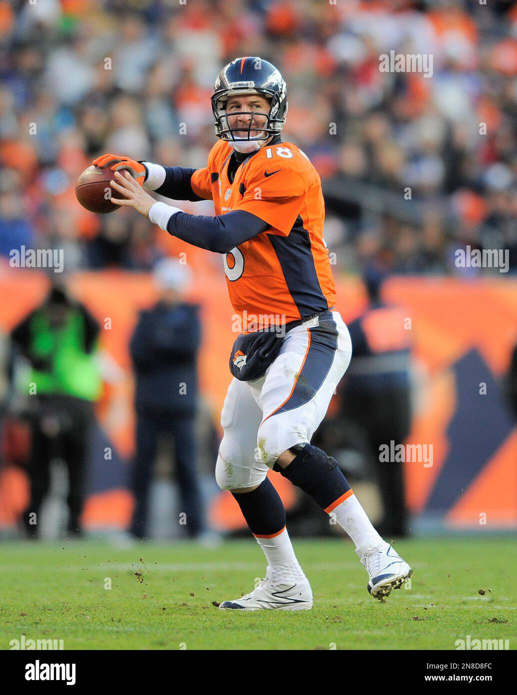 Denver Broncos quarterback Peyton Manning sets up to throw a pass ...