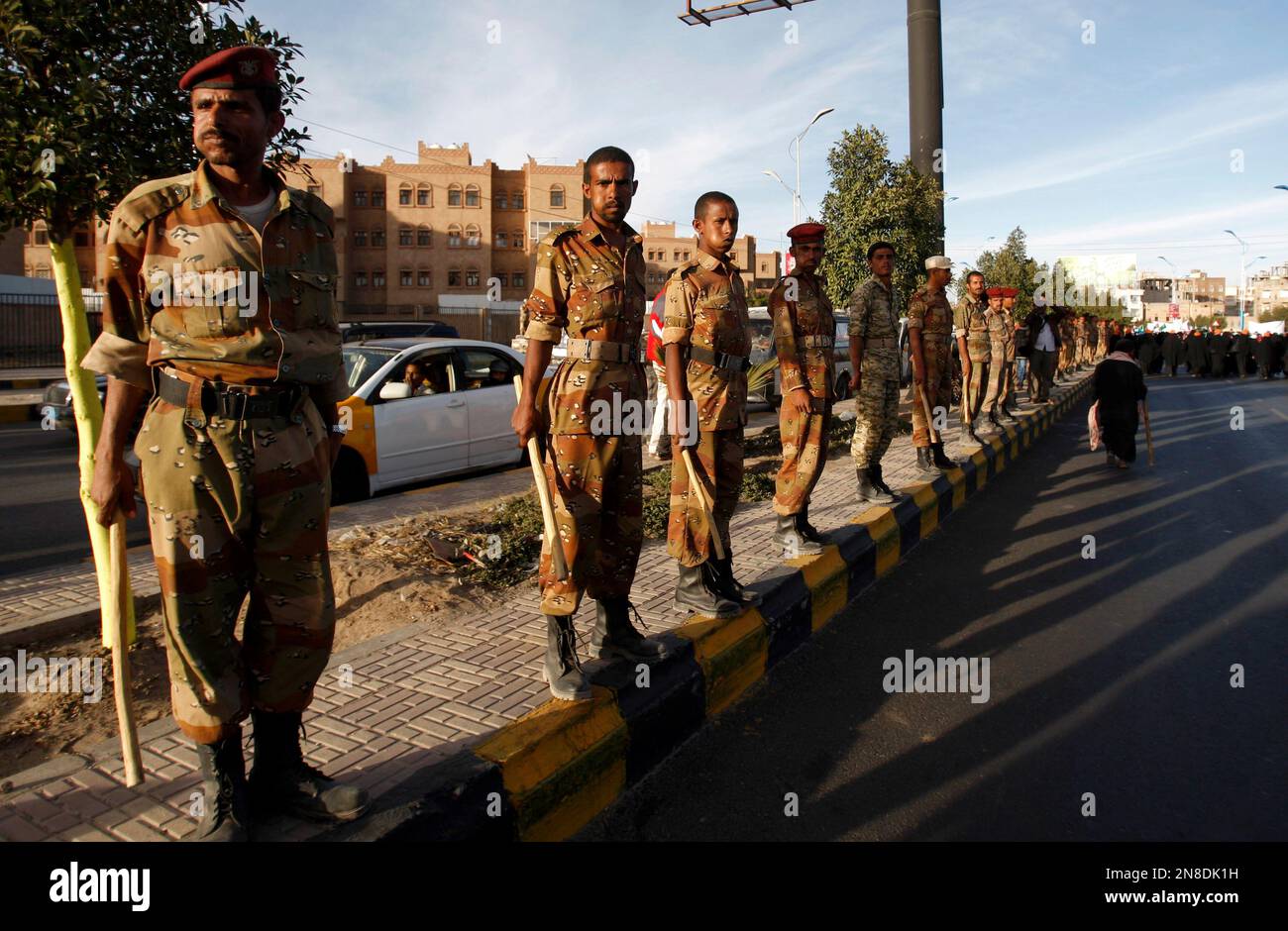 Yemeni soldiers stand guard near the residence of Yemen's president Abed Rabbu Mansour Hadi during a rally to show their support in Sanaa, Yemen, Thursday, Dec. 20, 2012. (AP Photo/Hani Mohammed) Stock Photo
