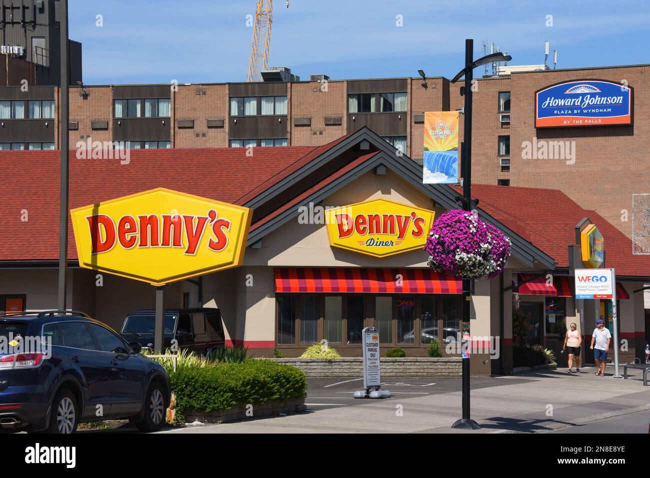 Niagara Falls, Canada - August 13, 2022: Denny's Diner and Howard Johnson Hotel on Victoria Avenue in the popular tourist destination of Niagara Falls Stock Photo