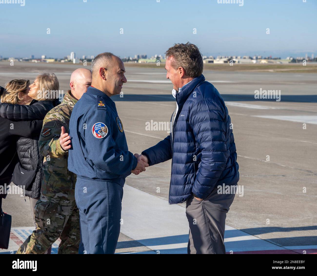 Adana, Turkey. 08th Feb, 2023. U.S. Ambassador to Turkey Jeffry Flake, right, is greeted by Turkish Air Force Brig. Gen. Mehmet Serkan Dan, left, after USAID rescue workers arrived at Incirlik Air Base, February 8, 2023 in Adana, Turkey. The Disaster Assistance Response Team arrived to join the search and rescue operations following a massive earthquake that struck central-southern Turkey and northern Syria. Credit: SrA David McLoney/US Air Force Photo/Alamy Live News Stock Photo