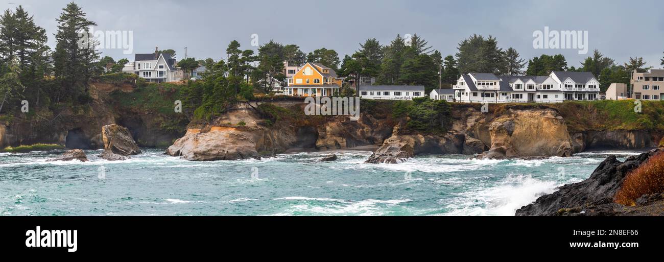 Panoramic view of some houses on the rock formations in Depoe Bay