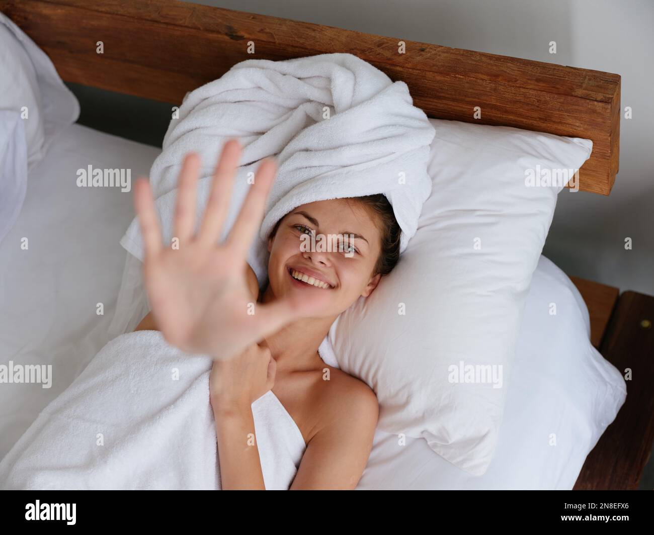 Woman towel shy hi-res stock photography and images - Alamy