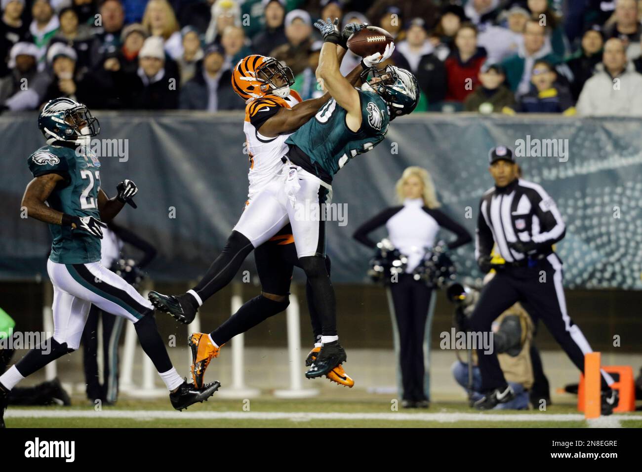 Philadelphia Eagles' Colt Anderson, right, breaks up a pass intended for  Cincinnati Bengals' A.J. Green, center, in the first half of an NFL  football game, Thursday, Dec. 13, 2012, in Philadelphia. At