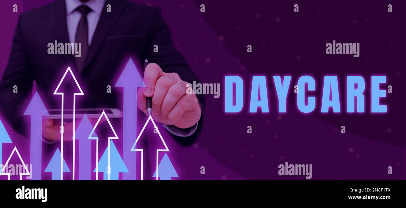 Hand writing sign Daycare. Business idea offering care to preschool