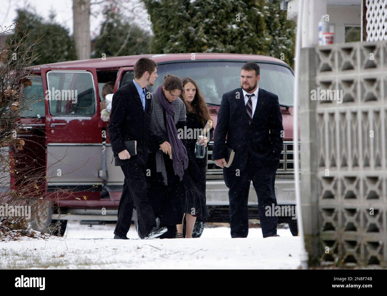 Family members of confessed serial killer Israel Keyes enter a funeral home, Sunday, Dec. 9