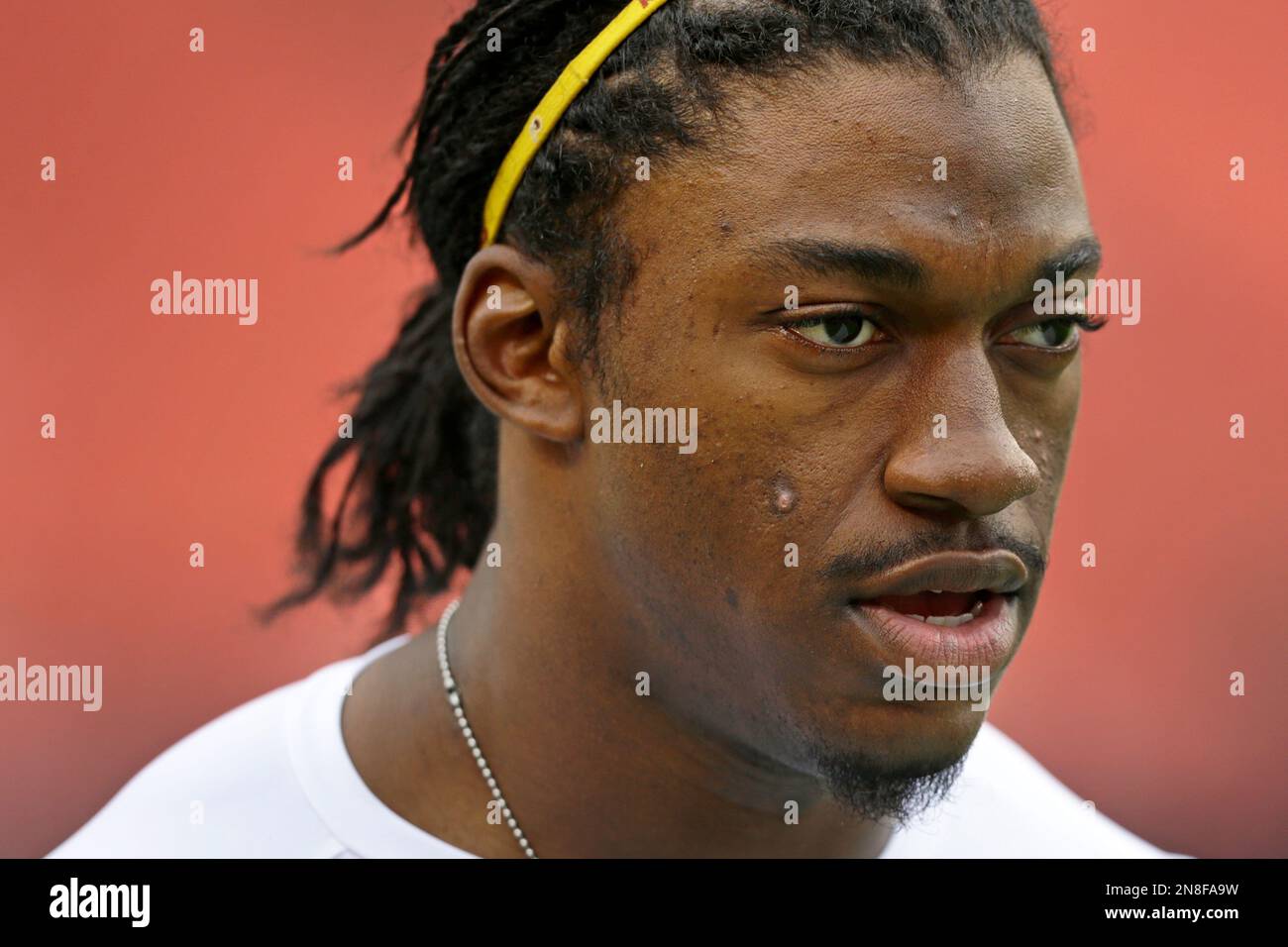Washington Redskins quarterback Robert Griffin III walks across the