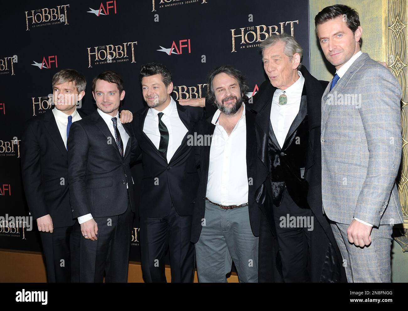 Actor Martin Freeman, left, actor Elijah Wood, actor Andy Serkis