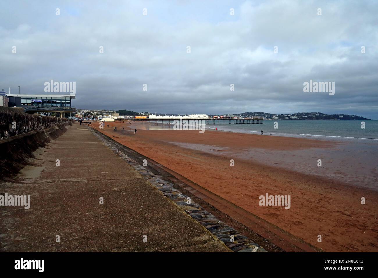 Paignton beach and Paignton pier and promenade at low tide. Taken