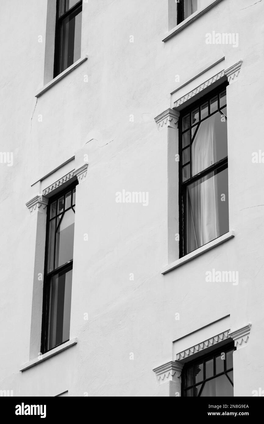 Northcote Mansions in Hampstead Square, Hampstead, London, UK. Beautiful residential white painted building with architectural detail. Stock Photo