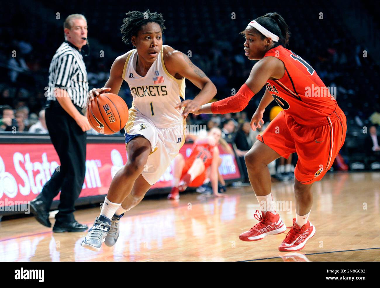 Tech guard Dawnn Maye (1) drives as guard Jasmine James