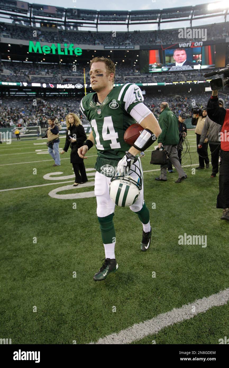 New York Jets quarterback Greg McElroy (14) walks off the field after