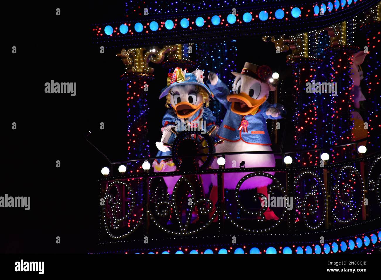 A Donald duck and Daisy during night parade at Tokyo Disney land Stock Photo