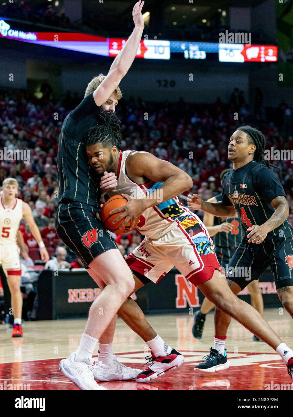 Nebraska's Derrick Walker (13) drives to the basket against Wisconsin's