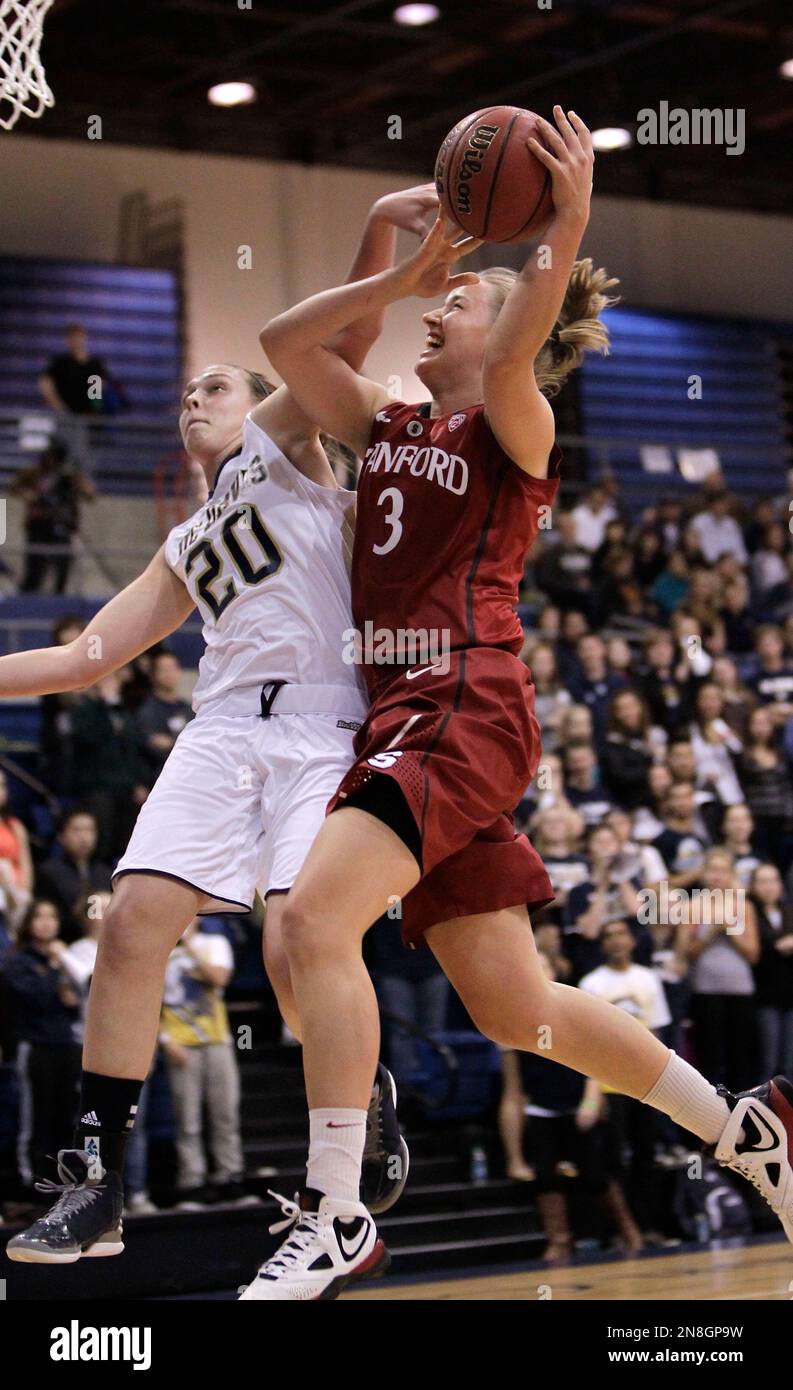 Stanford forward Mikaela Ruef, right, is fouled by UC Davis forward ...