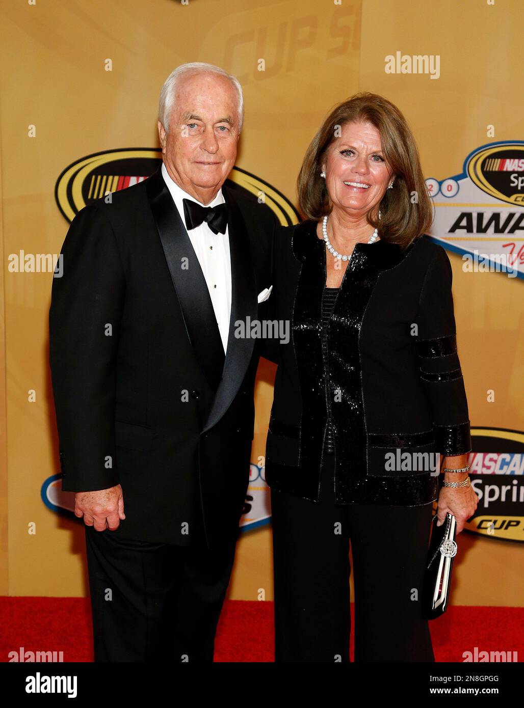 Roger Penske, left, and Kathy Penske arrive for the NASCAR Sprint Cup Series auto racing awards on Friday, Nov. 30, 2012, in Las Vegas. (AP Photo/Isaac Brekken) Stock Photo