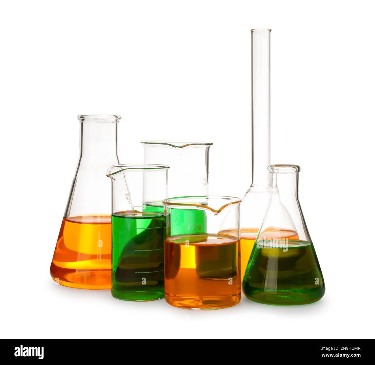 Laboratory glassware with colorful liquids on white background Stock ...