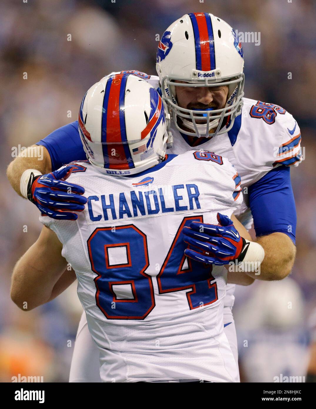 Buffalo Bills tight end Lee Smith, right, jumps into the arms of