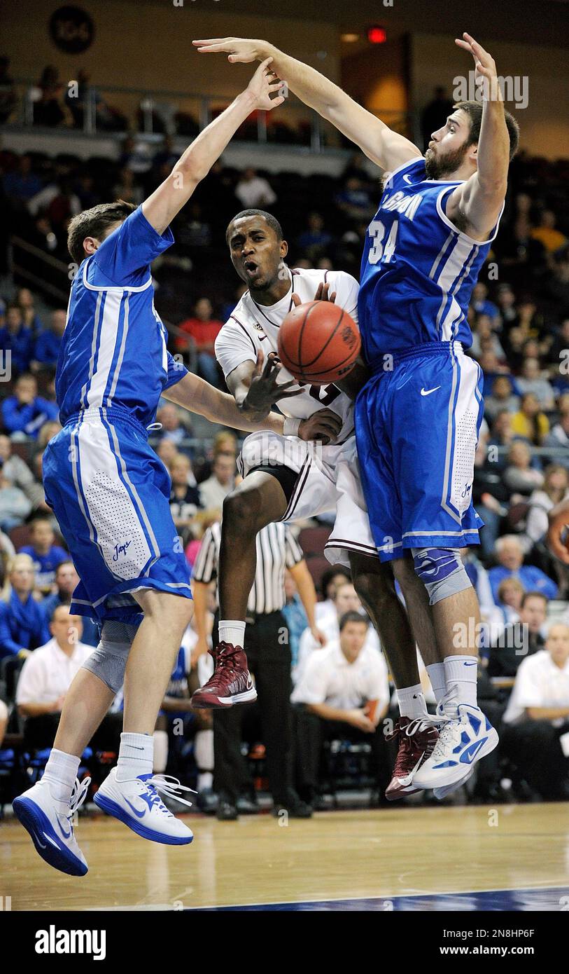 Arizona State's Chris Colvin (2) passes the ball between Creighton's