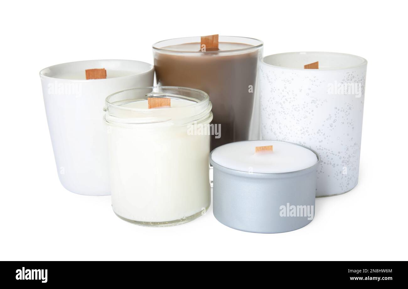 Beautiful candles with wooden wicks on white background Stock Photo Alamy