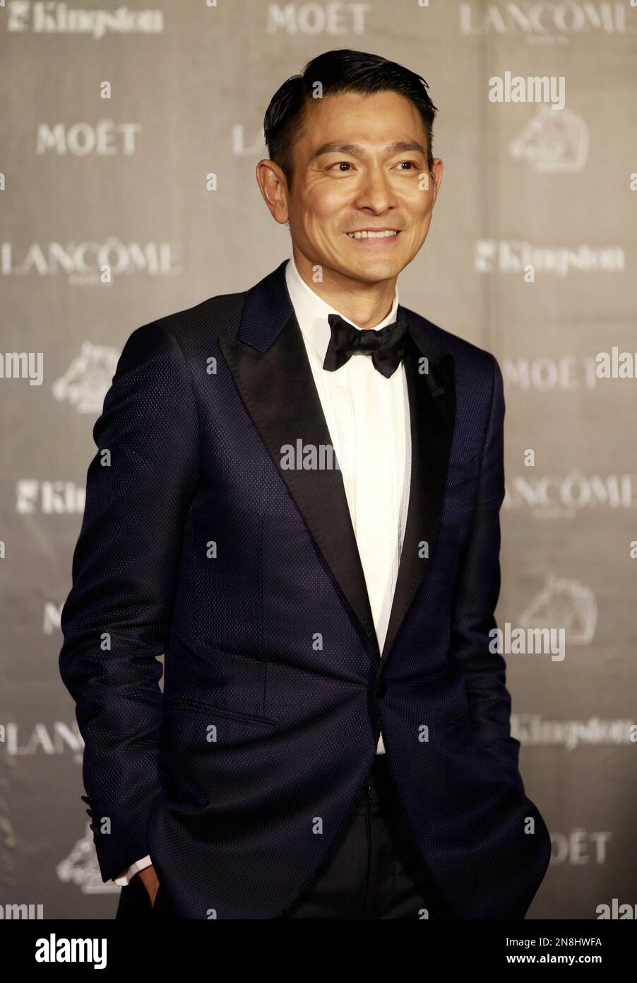 Andy Yu Hong Kong actor Andy Lau smiles at the media after attending at the ...