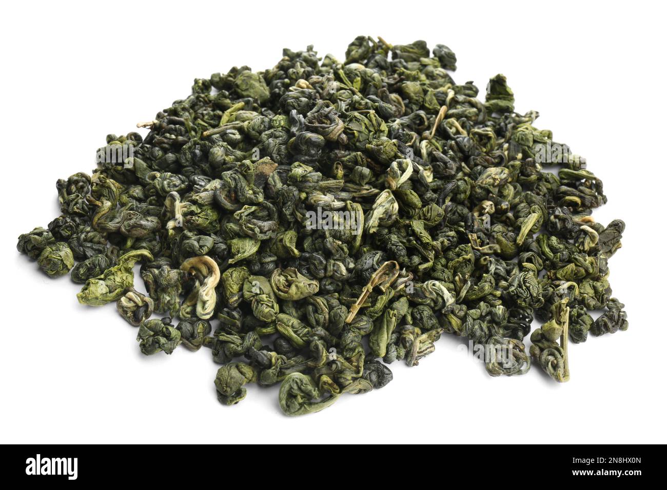 Pile of dried green tea leaves on white background Stock Photo Alamy