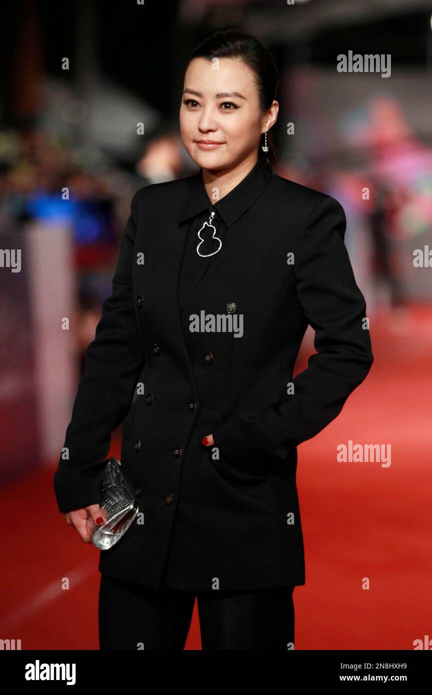Chinese actress Hao Lei smiles as she arrives at the 49th Golden Horse ...