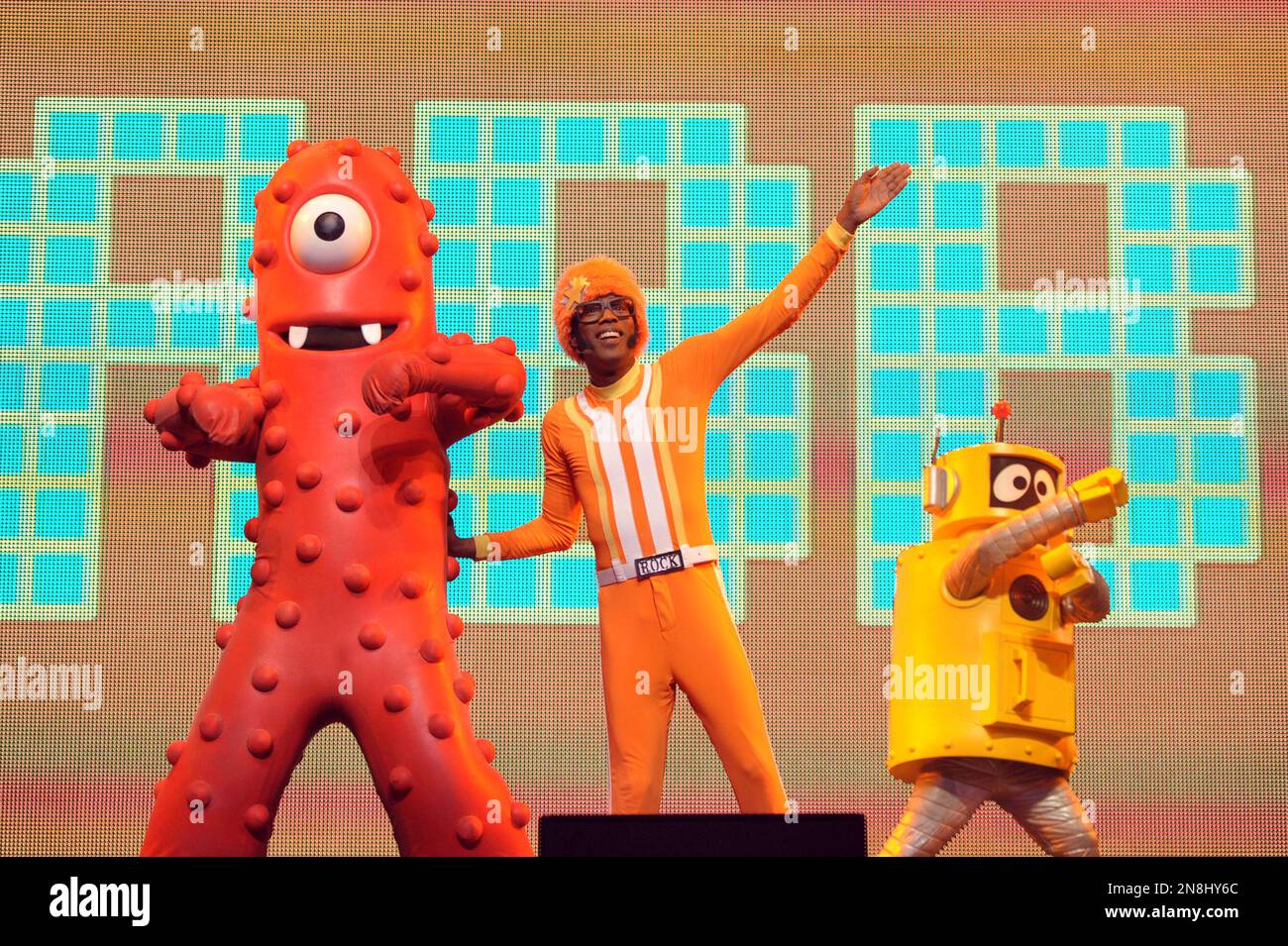 DJ Lance Rock, center, Muno and Plex perform onstage at Yo Gabba Gabba!  Live!: Get The Sillies Out! 50+ city tour kick-off performance on  Thanksgiving weekend at Nokia Theatre L.A. Live on