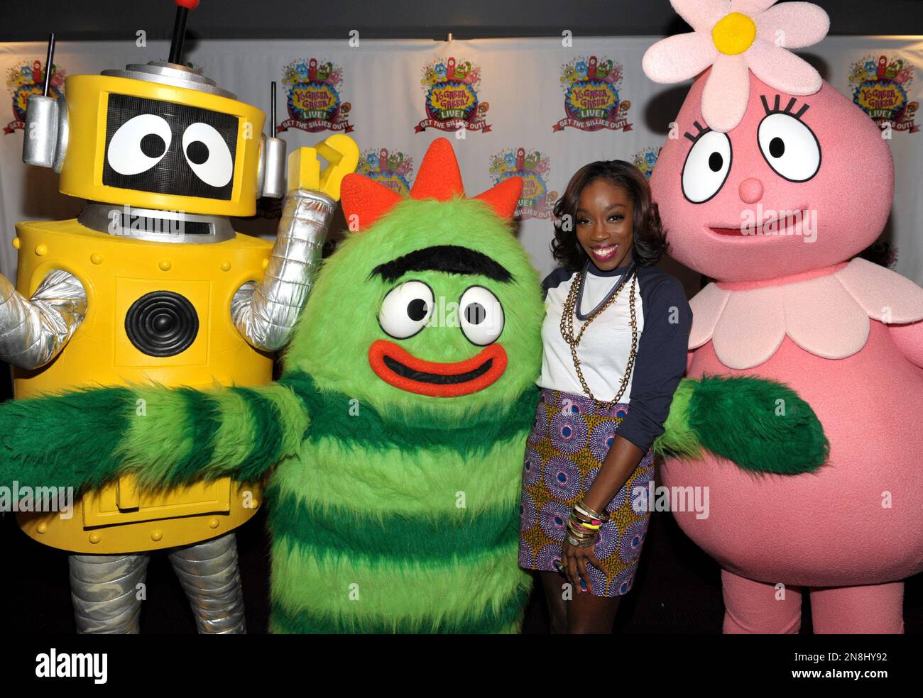 Estelle Swaray, 2nd from right, poses with Plex, Brobee and Foofa at Yo  Gabba Gabba! Live!: Get The Sillies Out! 50+ city tour kick-off performance  on Thanksgiving weekend at Nokia Theatre L.A.