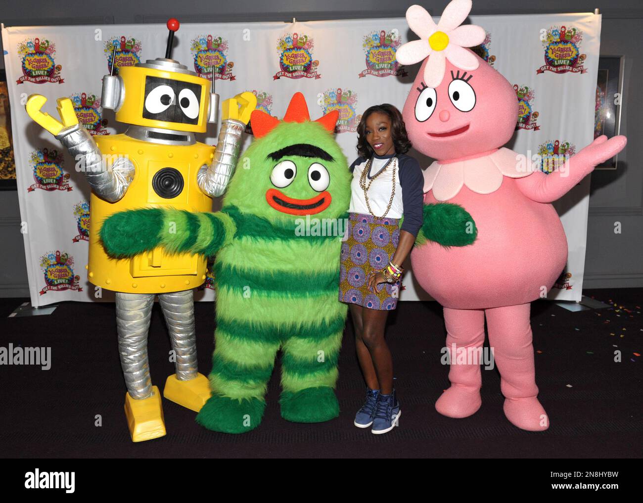 https://c8.alamy.com/comp/2N8HYBW/estelle-swaray-2nd-from-right-poses-with-plex-brobee-and-foofa-at-yo-gabba-gabba!-live!-get-the-sillies-out!-50-city-tour-kick-off-performance-on-thanksgiving-weekend-at-nokia-theatre-la-live-on-friday-nov-23-2012-in-los-angeles-photo-by-john-shearerinvision-for-gabbacadabra-llcap-images-2N8HYBW.jpg