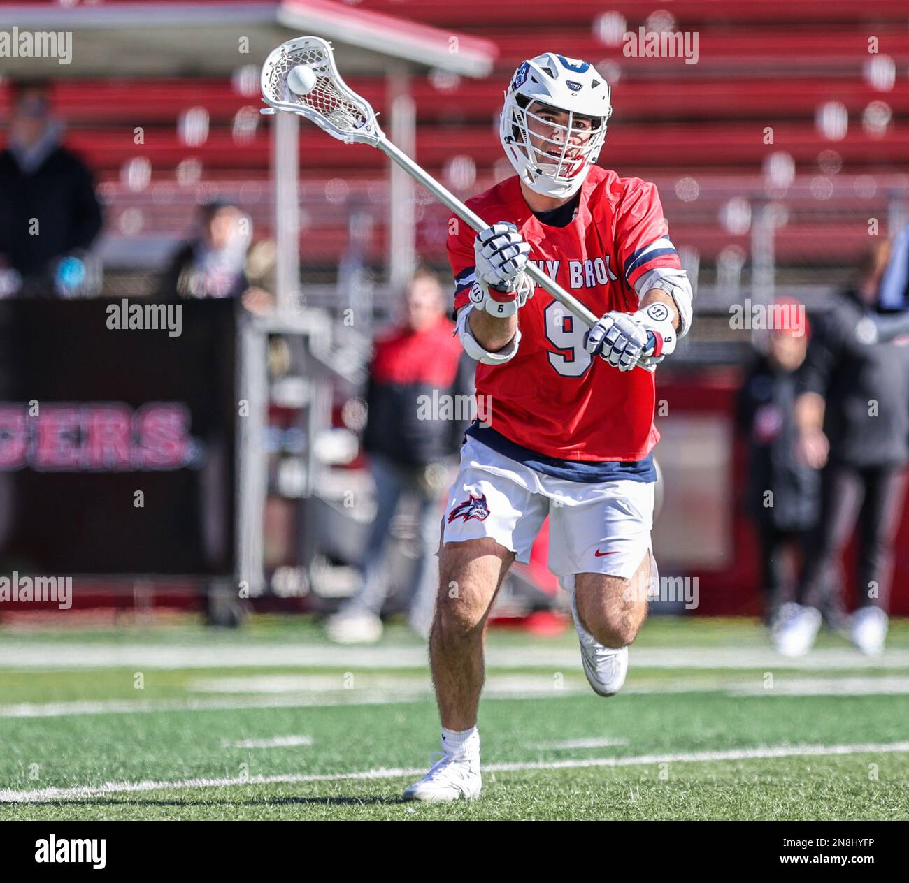 February 11, 2023 Stony Brook attack Will Button (9) during a NCAA Men