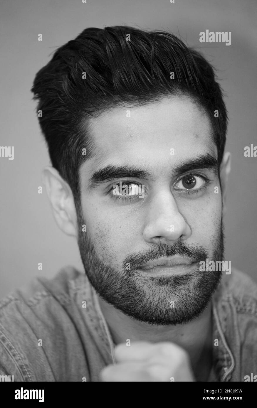 Portrait of British actor Sacha Dhawan, attending the 2017 London Film Comic Con as a guest signer, at the Olympia London exhibition and event venue. Stock Photo