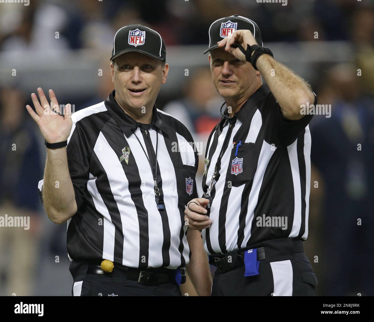 Umpire Tony Michalek (115), left, and line judge Tom Stephan (68 ...