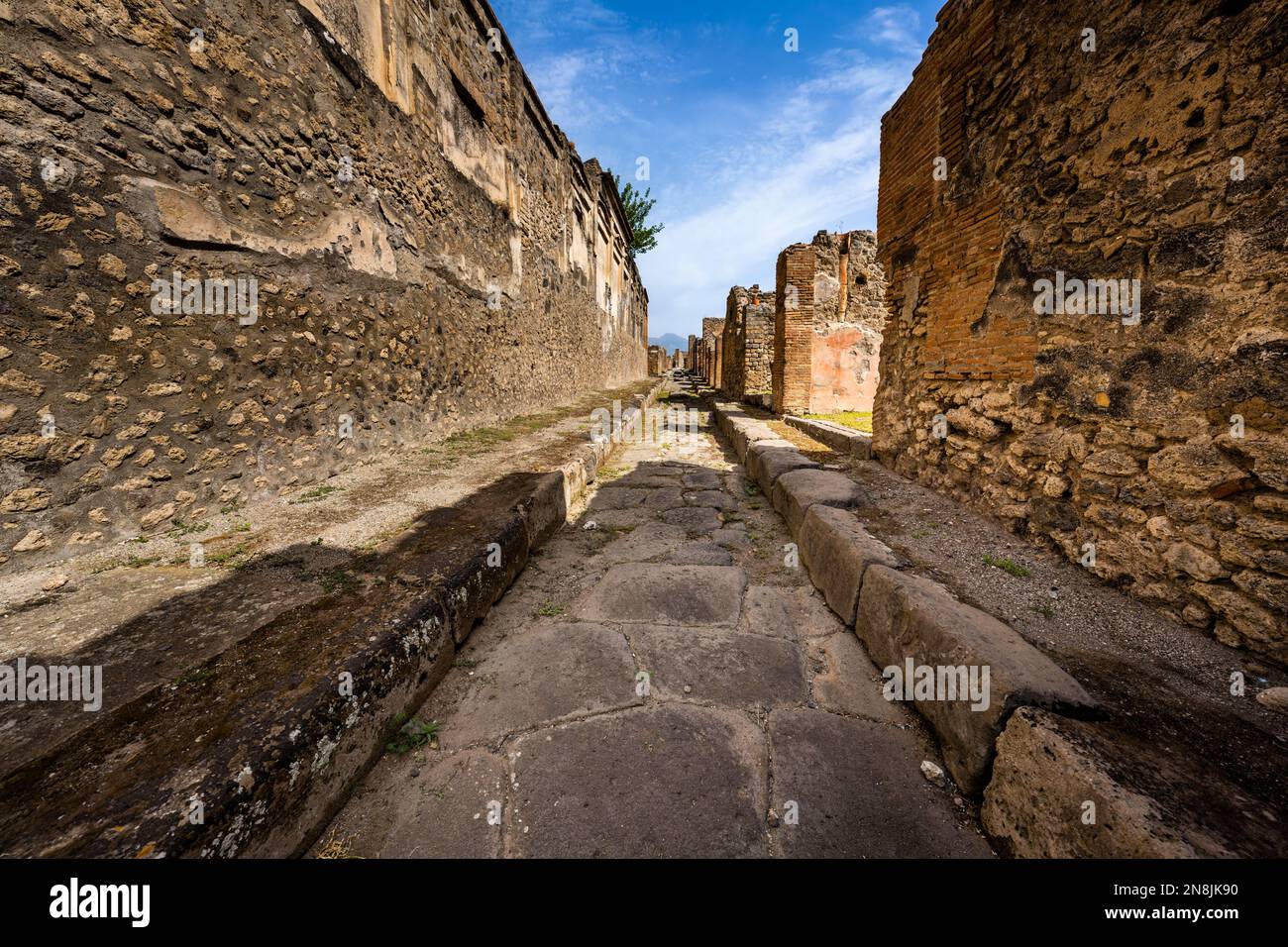 Street in the ruins of the ancient Roman city of Pompeii Stock Photo