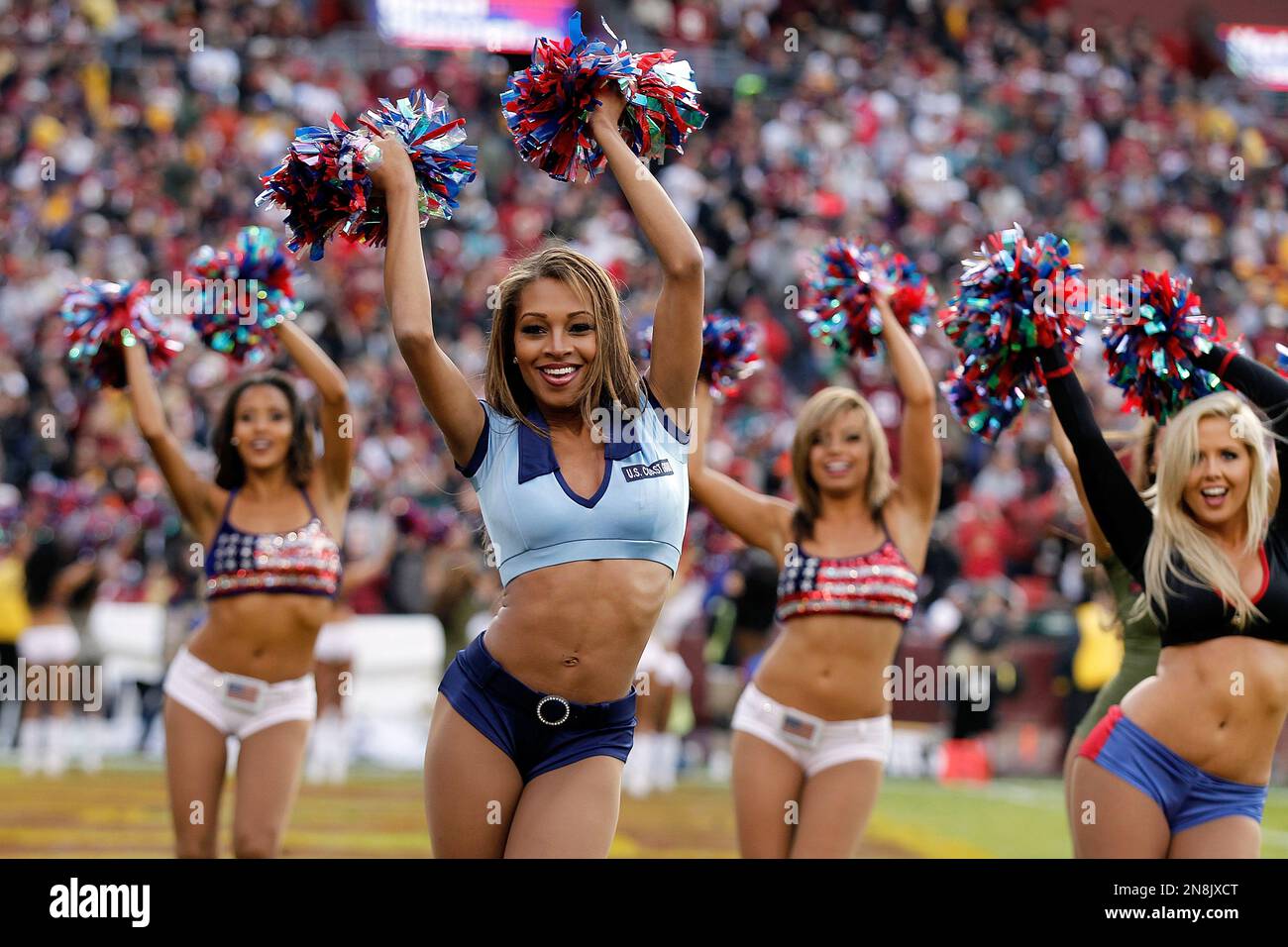 Supporting the NFL s Salute to Service the Washington Redskins cheerleaders perform during the second half of an NFL football game against the Philadelphia Eagles in Landover Md. Sunday Nov. 18 2012. ...