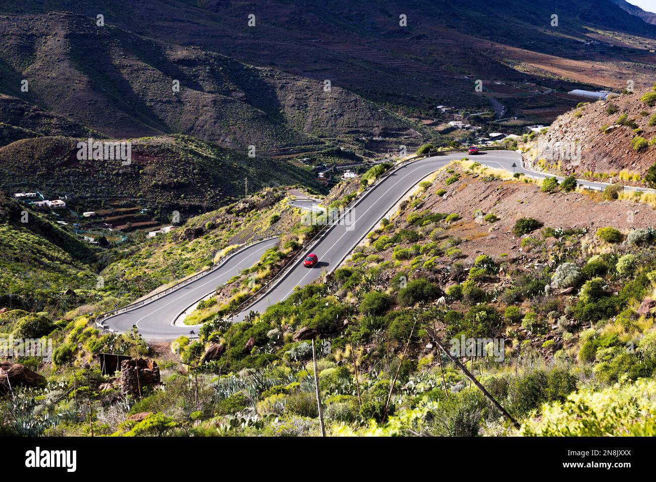 The winding road throught the mountains on the Gran Canaria. Daylight. Stock Photo