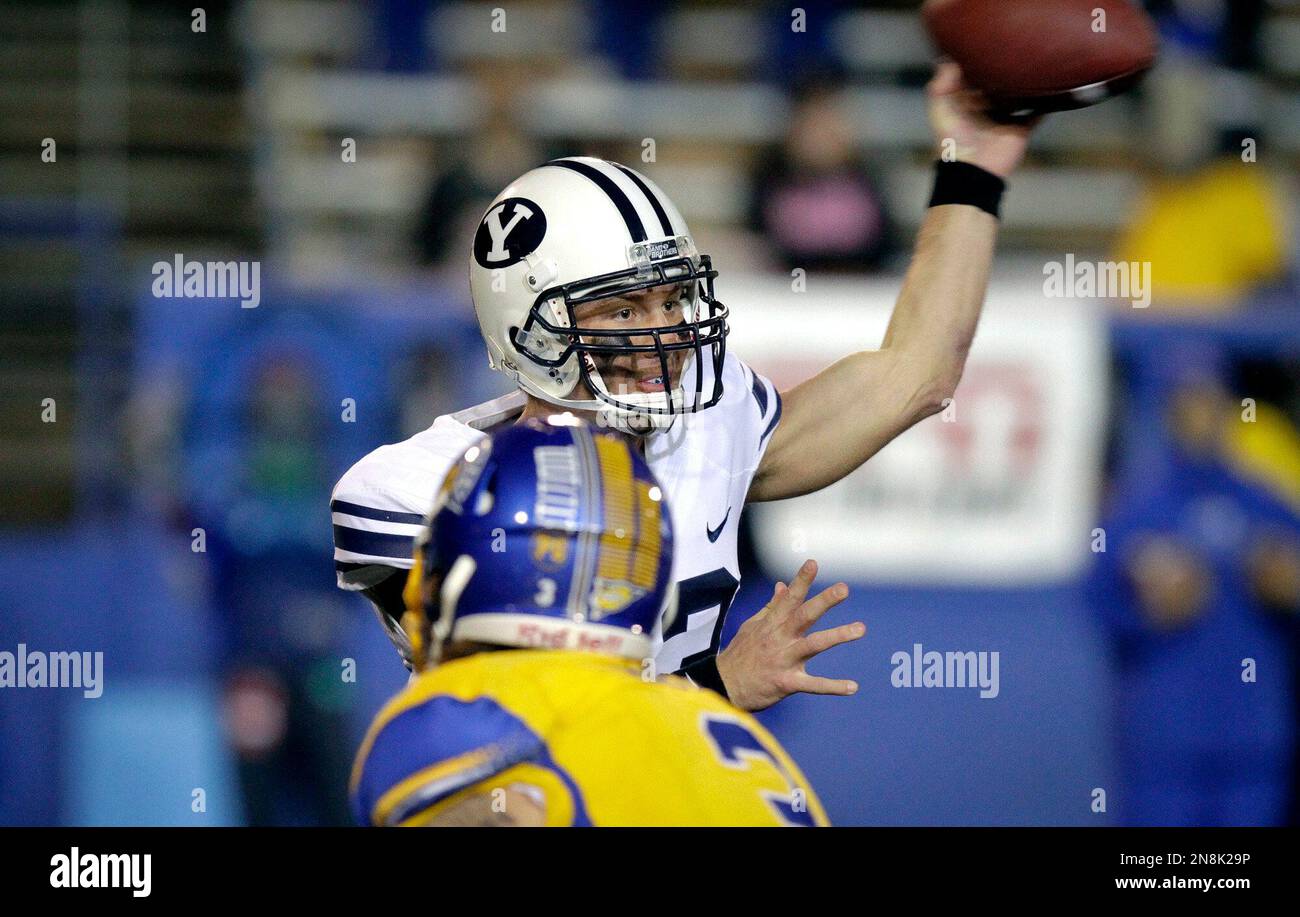Brigham Young quarterback Riley Nelson (13) throws a pass against San
