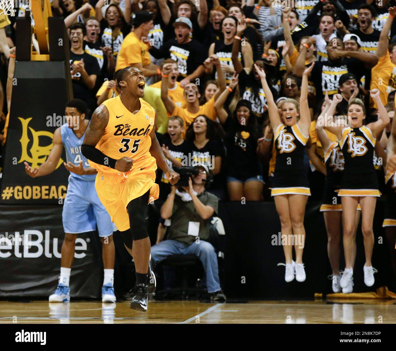 Long Beach State's Dan Jennings (35) celebrates a basket as North ...