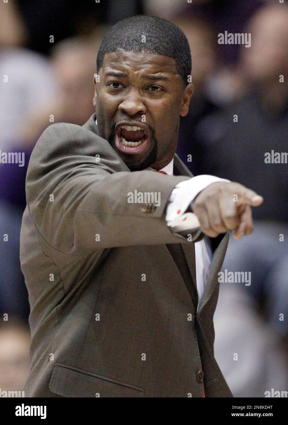 Mississippi Valley State head coach Chico Potts points as he directs his team during the first half of an NCAA college basketball game against Northwestern in Evanston, Ill., on Thursday, Nov. 15, 2012. (AP Photo/Nam Y. Huh) Stock Photo