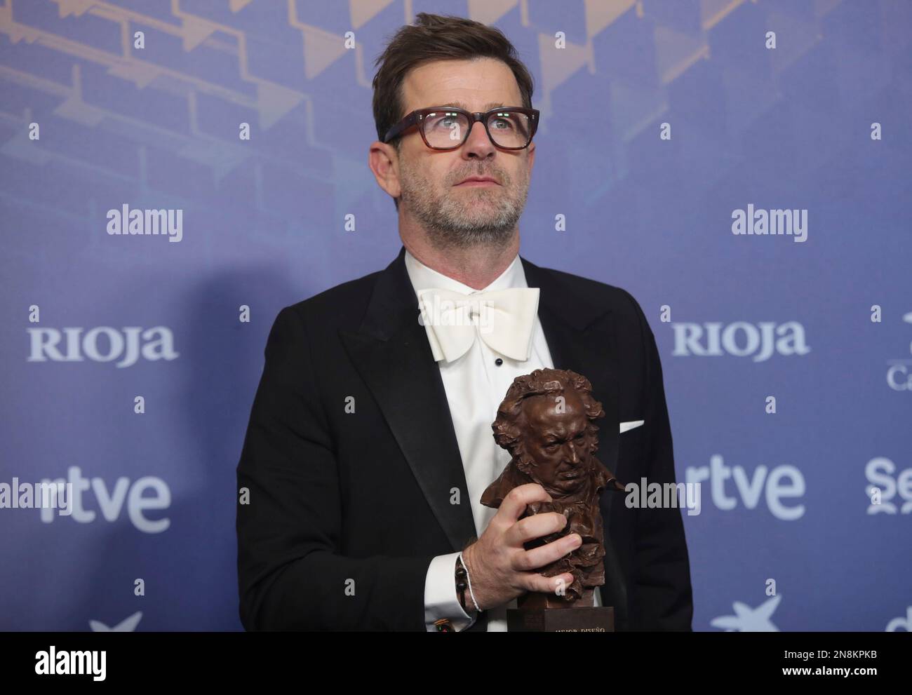 The winner of Best Costume Design for 'Modelo 77' Fernando Garcia poses  with his award during the gala of the 37th edition of the Goya Awards at  the Palacio de Congresos y
