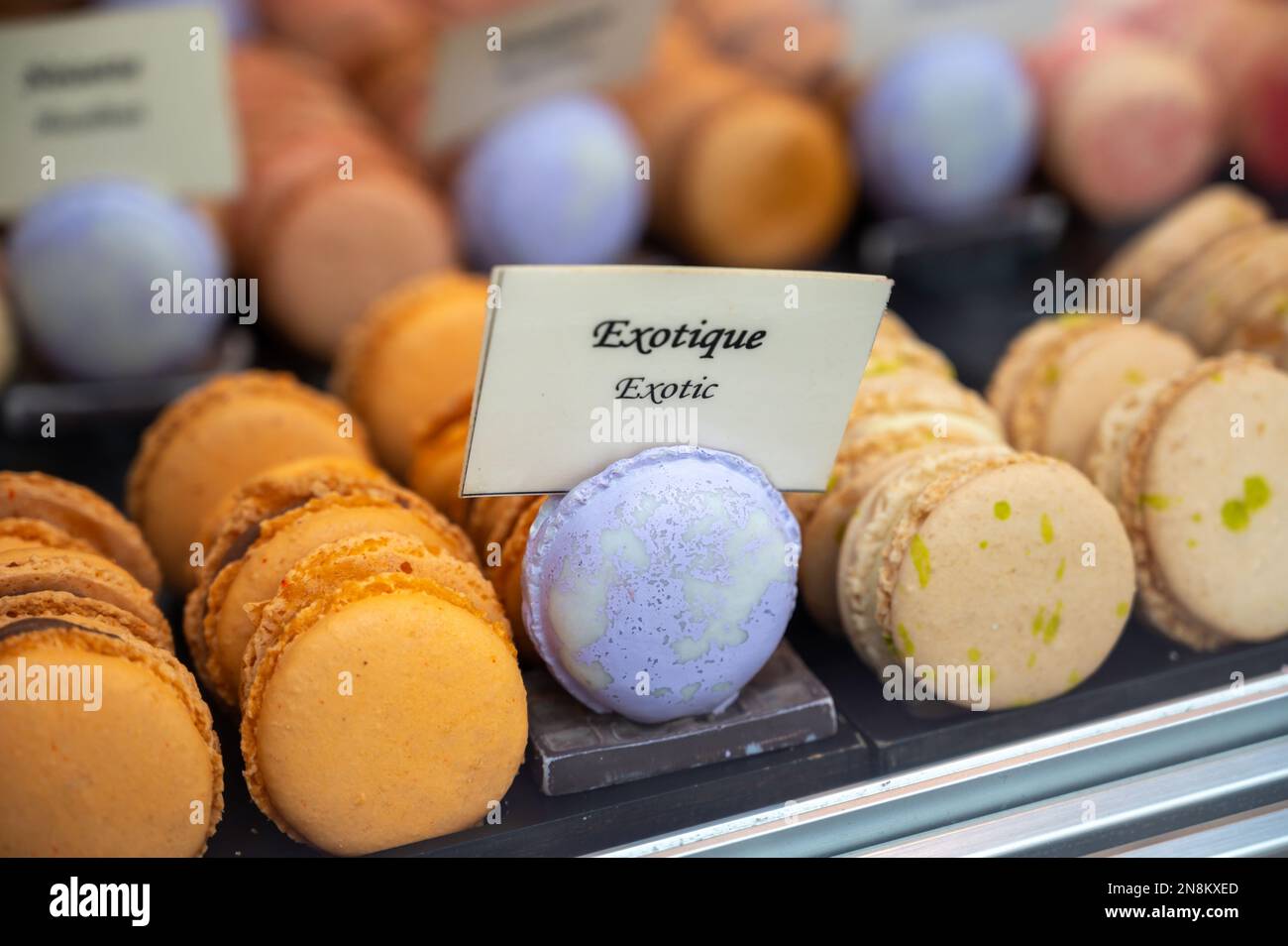 Macarons or French macaroon  sweet meringue-based confection made with egg white, icing sugar, granulated sugar, almond meal, and food colouring, swee Stock Photo