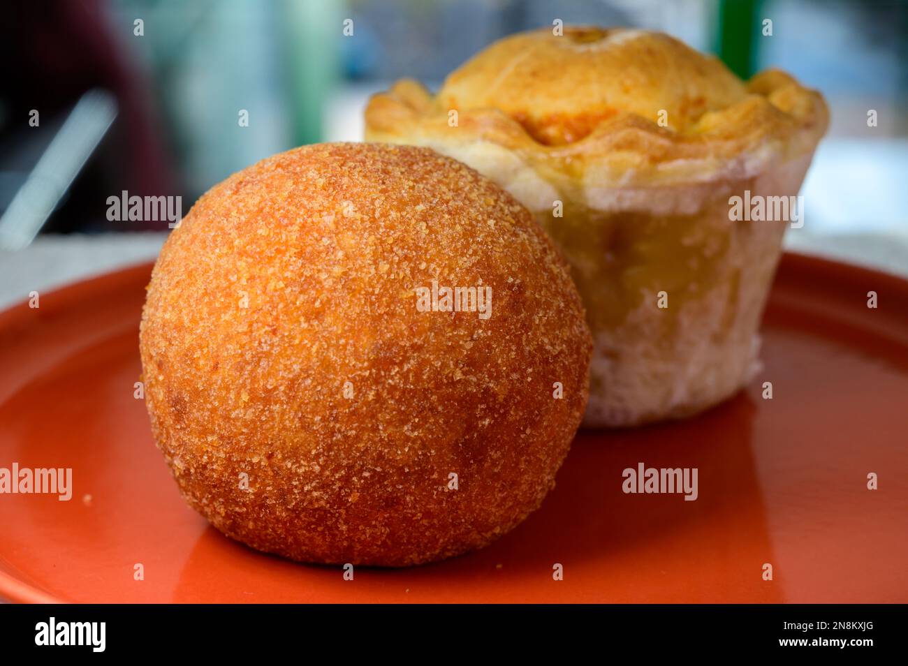 Traditional street food in UK, stuffed fried Scotch eggs with