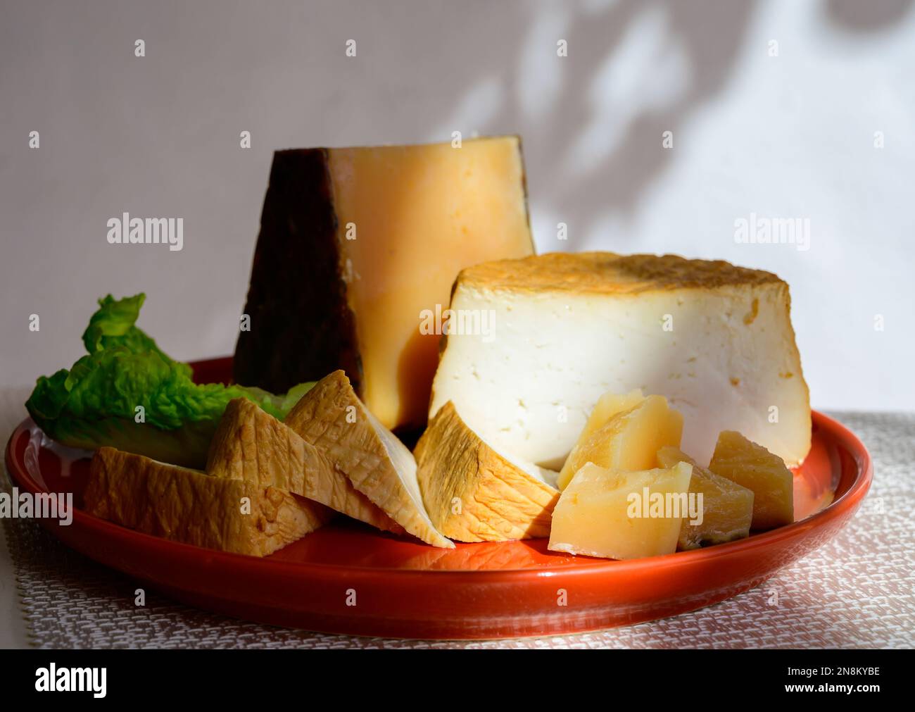 Spanish cheeses collection, pieces of smoked and old matured goat